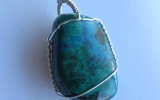 Chrysocolla pendant wire wrapped in sterling silver