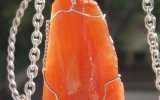 Coral calcite pendant wire wrapped in sterling silver