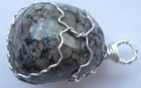 Crinoide stone pendant wire wrapped in sterling silver