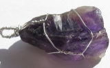 Raw dark purple amethyst crystal pendant wire wrapped in sterling silver