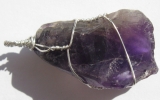 Raw dark purple amethyst crystal pendant wire wrapped in sterling silver
