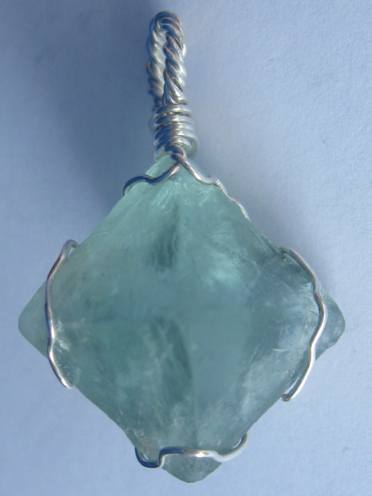Raw fluorite octahedron crystal pendant wire wrapped in sterling silver