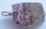 Raw fluorite crystal pendant wire wrapped in sterling silver