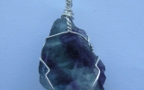 Raw fluorite crystal pendant wire wrapped in sterling silver