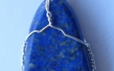 Lapis lazuli stone pendant wire wrapped in sterling silver