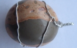 Leopardskin jasper pendant wire wrapped in sterling silver