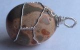 Leopardskin jasper pendant wire wrapped in sterling silver