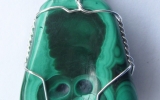 Malachite stone pendant wire wrapped in sterling silver