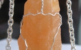 Orange calcite pendant wire wrapped in sterling silver