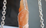 Tangerine calcite pendant wire wrapped in sterling silver