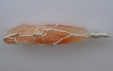 Tangerine calcite pendant wire wrapped in sterling silver