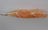 Tangerine calcite pendant wire wrapped in sterling silver