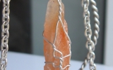 Tangerine calcite pendant wire wrapped in sterling silver