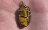 Tiger eye stone pendant wire wrapped in sterling silver