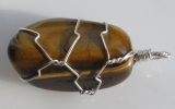 Tiger eye stone pendant wire wrapped in sterling silver