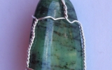 Zoisite pendant wire wrapped in sterling silver