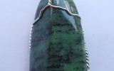 Zoisite pendant wire wrapped in sterling silver